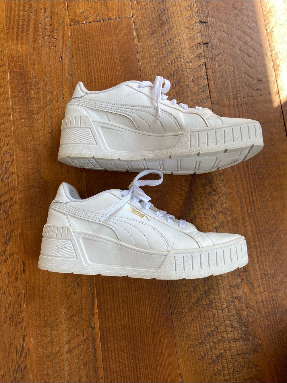 Puma White Platform Sneakers with Gold Accent